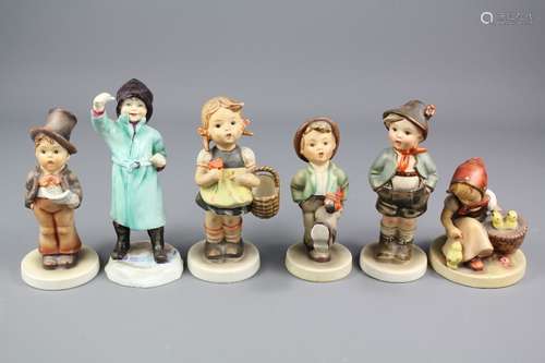 A Quantity of Continental Figurines, this lot comprises five German Hummel figurines two girls and three boys, Austrian figure of a boy, together with a Royal Worcester figurine entitled 'February' modelled by Doughty and a Souter Johnnie figurine