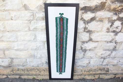 An Embroidered Middle Eastern Woven Belt; the belt being linen backed approx 36 x 127 cms, framed and glazed