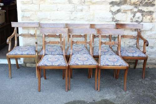 Six Victorian Mahogany and Rosewood Dining Chairs, in the Regency-style, two carvers and six chairs with tapestry seats