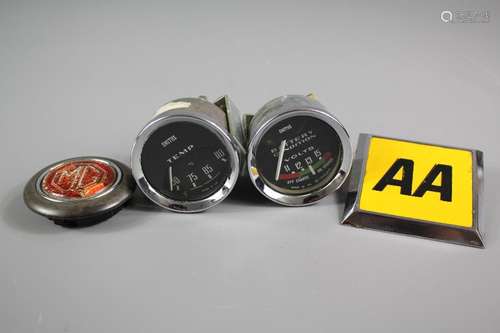 Two Smith Car Gauges; together with MG Midget horn button and AA badge