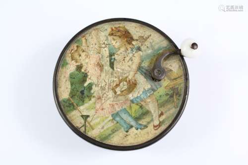 A Victorian Mechanical Circular Music Box; the box depicting two young girls
