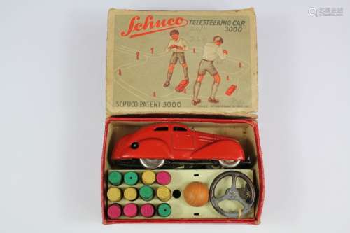 A Schuco Telesteering Clockwork Car 3000; in the original box