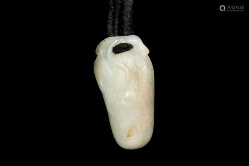 A PALE CELADON JADE CARVING OF A LITCHI