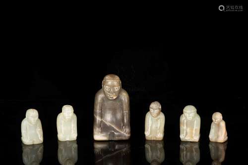 SIX ANCIENT JADE TOMB CARVINGS OF KNEELING FAMILY