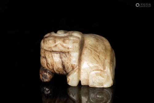 A MOTTLED RUSSET JADE CARVING OF A MYTHICAL BEAST-TIANLU