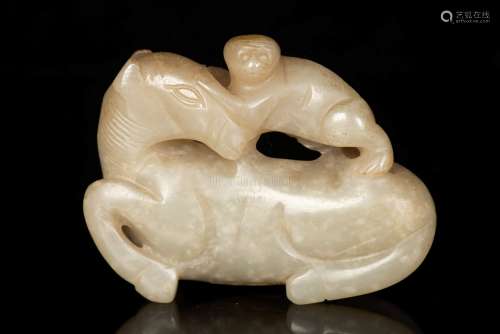 A YELLOW JADE CARVING OF HORSE AND MONKEY