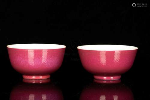 A PAIR OF FINELY POTTED RUBY RED GLAZED BOWLS