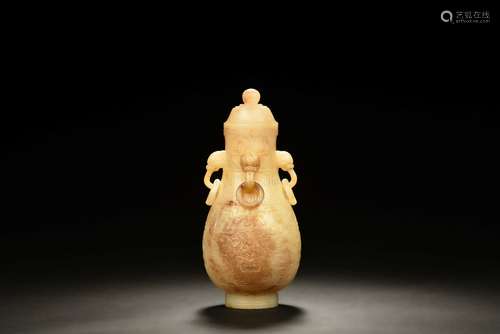 CARVED WHITE JADE FOUR-HANDLE BOTTLE VASE