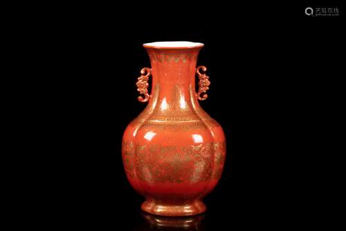 A CORAL-GROUND GILT-DECORATED QUATREFOIL VASE