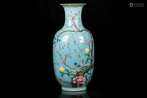 A LARGE BLUE-GROUND FAMILLE ROSE VASE