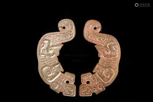 A PAIR OFJADE DRAGON-FORM PENDANTS