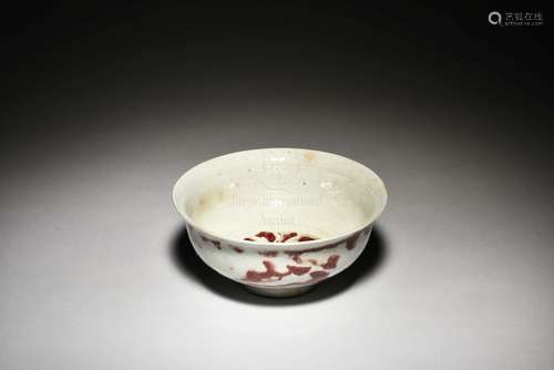 UNDERGLAZED RED AND CARVED BOWL