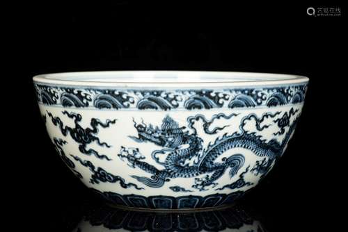 A RARE ANHUA-DECORATED BLUE AND WHITE ‘DRAGON’ BOWL