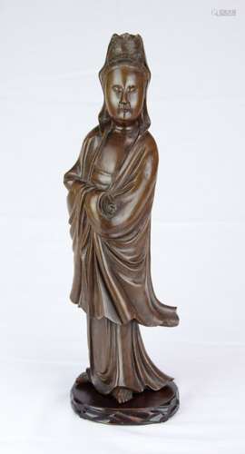 A Longyan wood Guanyin statue