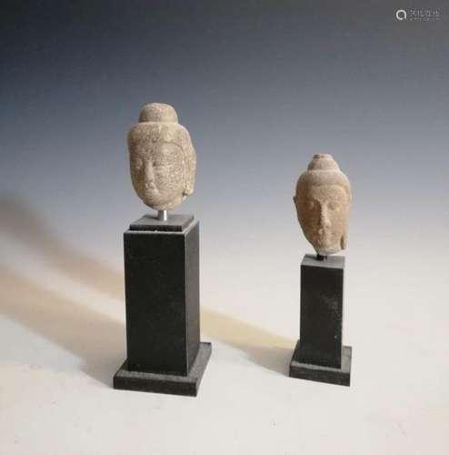 Stone carved small Buddha head pair two