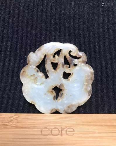 A white jade open work carved  pendant