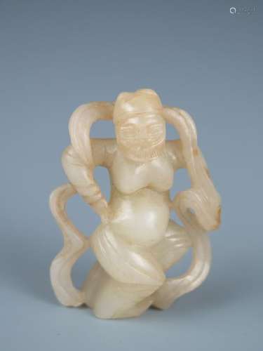 A carved white jade dancer