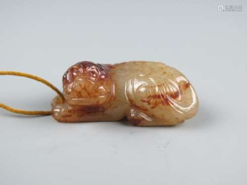 A carved jade pendant