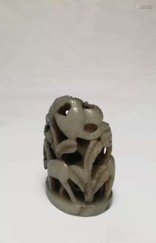 A celadon jade open work carved of a cover knob