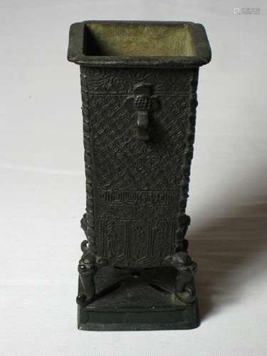 A bronze rectangle brush pot