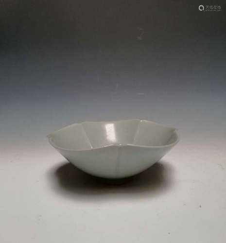 The celadon glaze as a flower shaped bowl