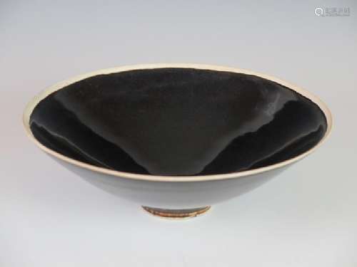 A ding black glazed tea bowl