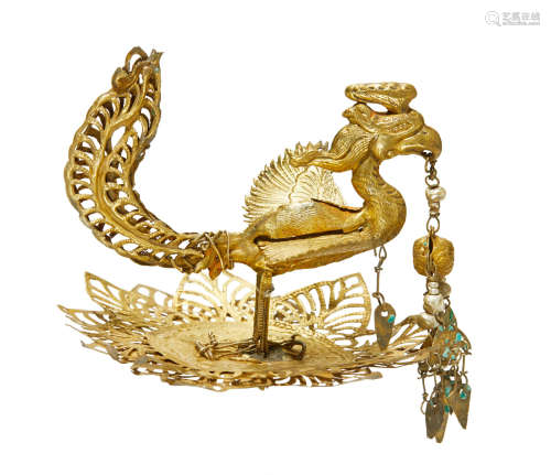 九至十一世纪 铜错金凤形头饰