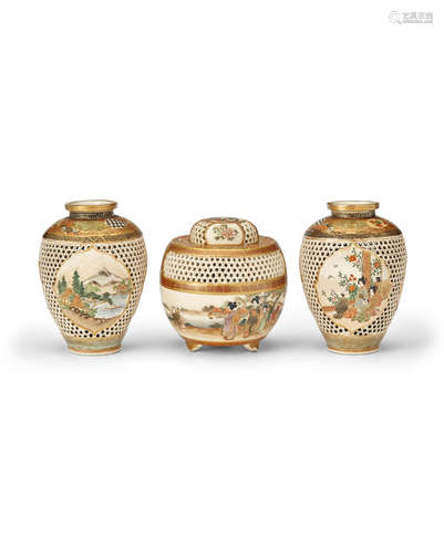 The first by Seizan, the second by Unzan, Meiji era (1868-1912), late 19th century A pair of reticulated Satsuma vases and a reticulated Satsuma incense burner