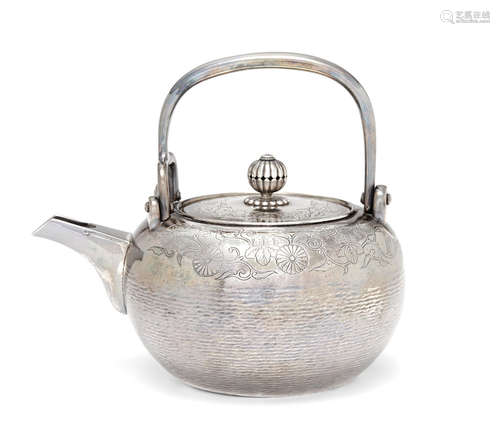 A silver tea potMeiji era (1868-1912), late 19th century NAKAGAWA JOEKI IX (1849–1911)