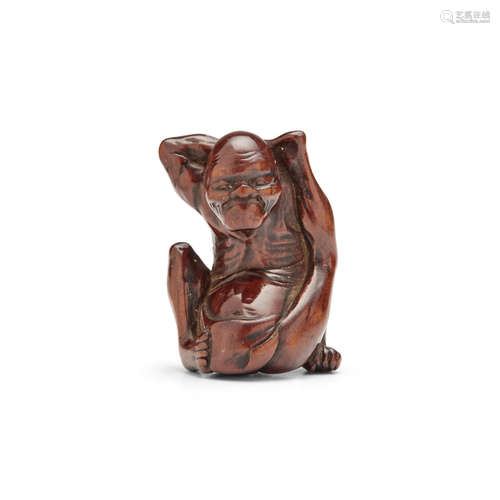 Edo period (1615-1868), 19th century A wood netsuke of a contortionist