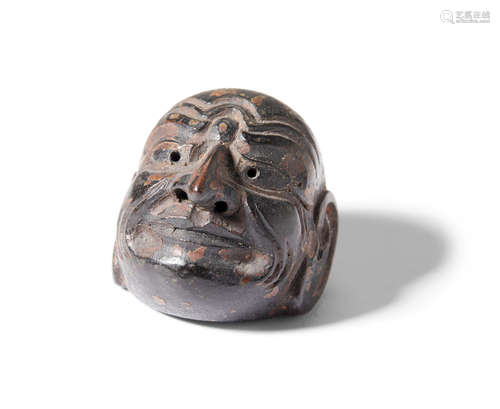 A wood mask netsukeMeiji (1868-1912) or Taisho (1912-1926) era, early 20th century Kano Tessai (1845-1925)