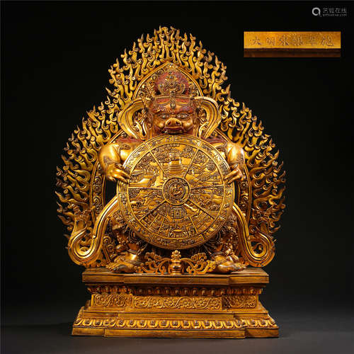 TIBETAN GILT BRONZE STANDING BUDDHIST GUARDIAN WITH SIX REALMS WHEEL OF LIFE