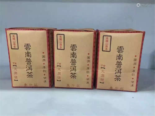 THREE PACKS OF CHINESE PU'ER TEA Y2000 1.5 KG