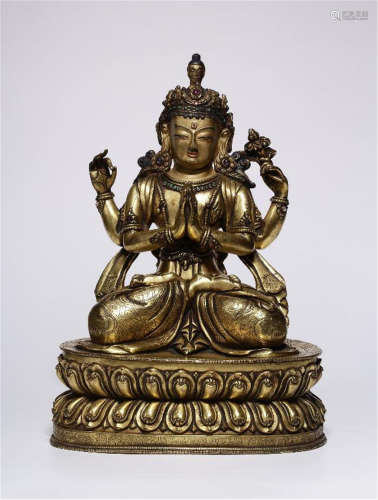 CHINESE GILT BRONZE SEATED FOUR ARM GUANYIN