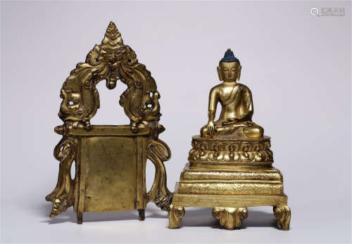 CHINESE GILT BRONZE SEATED SAKAYMUNI AND NICHE