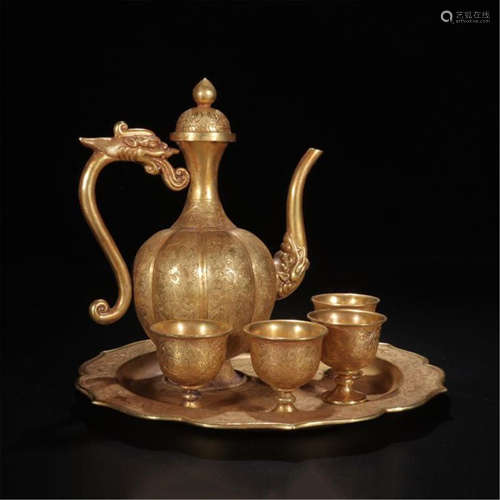 CHINESE GILT BRONZE DRAGON HANDLE KETTLE WITH FOUR CUPS