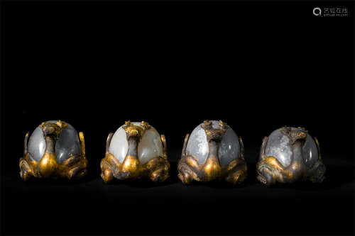 FOUR CHINESE GILT BRONZE AGATE CARPET WEIGHT