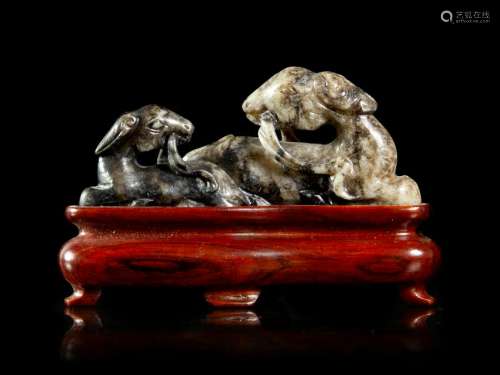 A Grey and Black Jade Figural Group of Double Rams