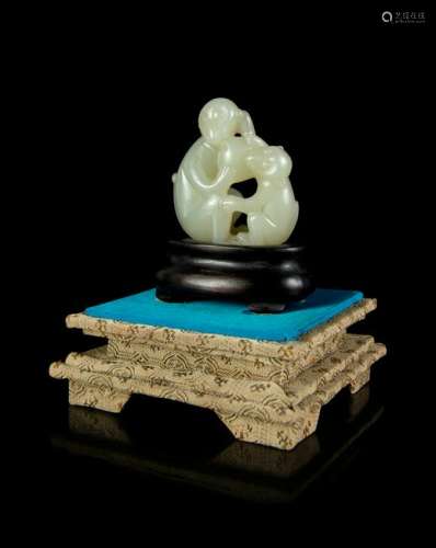 A Celadon Jade 'Monkey and Peach' Group Height 2 in., 5