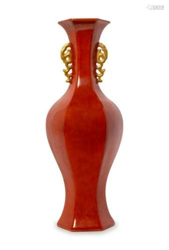 A Red Glazed Porcelain Double Handled Faceted Vase