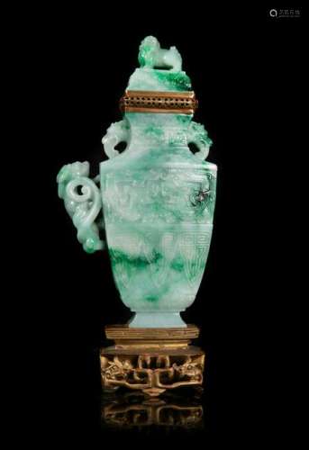 A Mottled Green Jadeite 'Dragon' Covered Vase Overall: