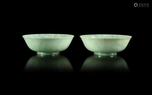A Pair of Mottled Apple Green Jadeite Bowls Each: