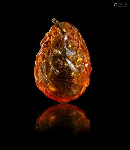 An Amber Pendant Length 2 in., 5 cm.