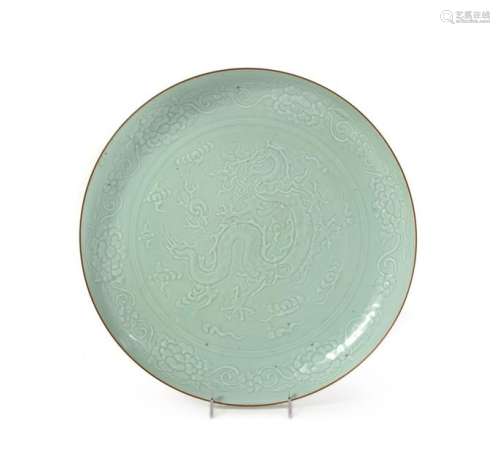 A Large Carved Celadon Glazed Porcelain Charger Diam 16