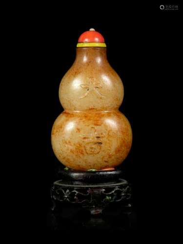 A Russet and Celadon Jade Double-Gourd Form Snuff