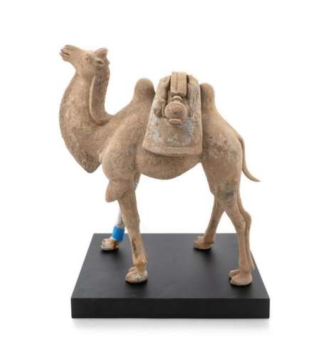 A Pottery Figure of a Bactrian Camel Height 17 1/2 in.,