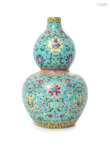 A Turquoise Ground Famille Rose Porcelain Gourd-Form