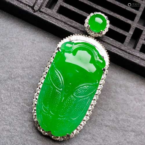 A Chinese Carved Jadeite Pendant