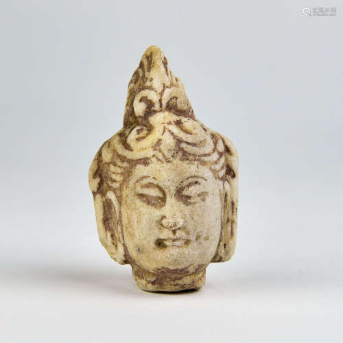 A Chinese Carved Marble Buddha Head
