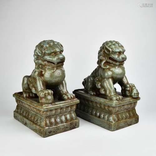 A Pair of Chinese Celadon Porcelain Foo-Dogs